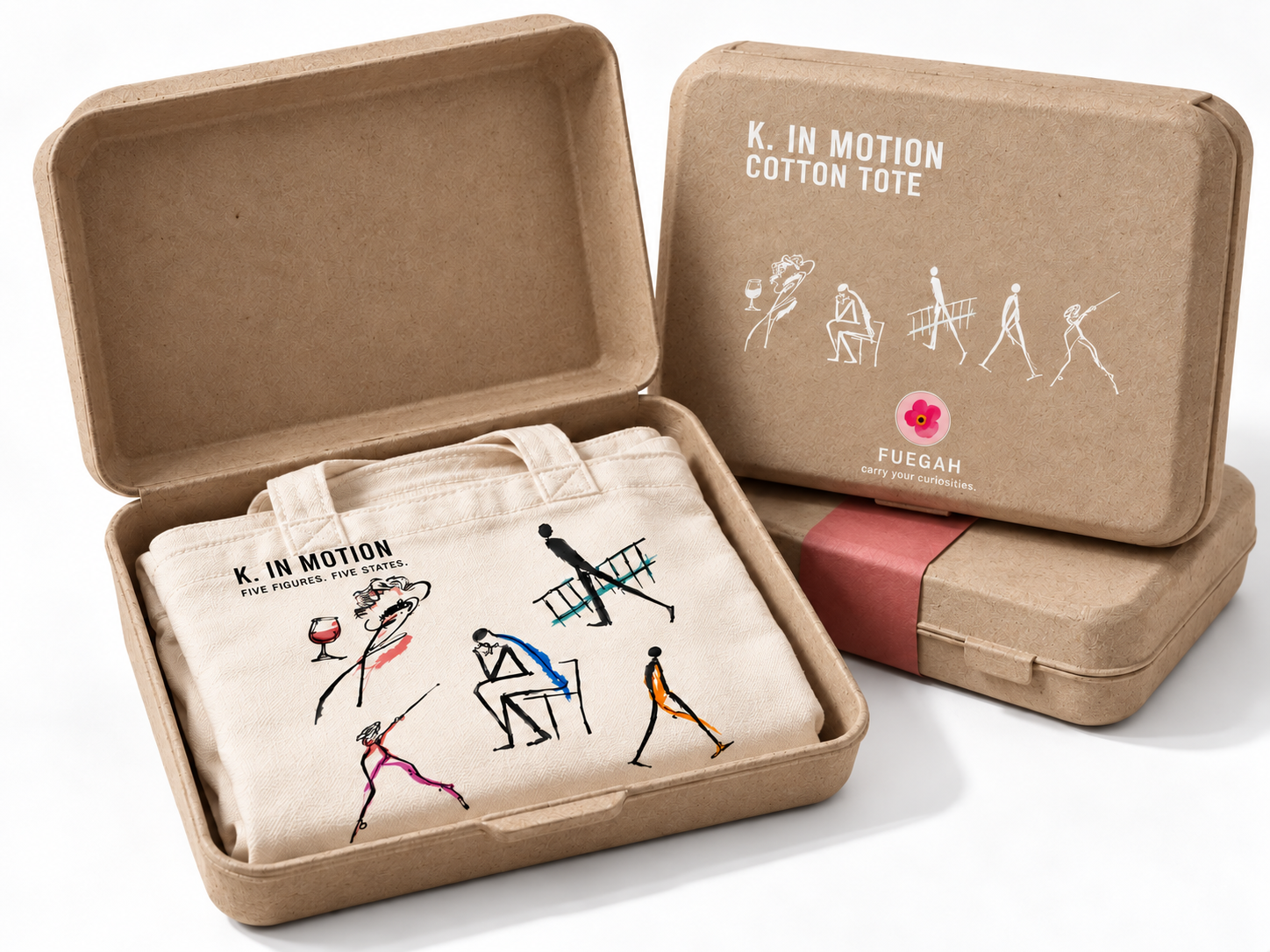 A white K. IN MOTION cotton tote presented inside tactile molded-pulp packaging
